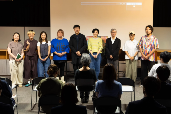 イベント登壇者と観客の集合写真